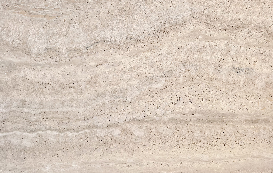 Vein-cut Italian travertine with warm linear movement